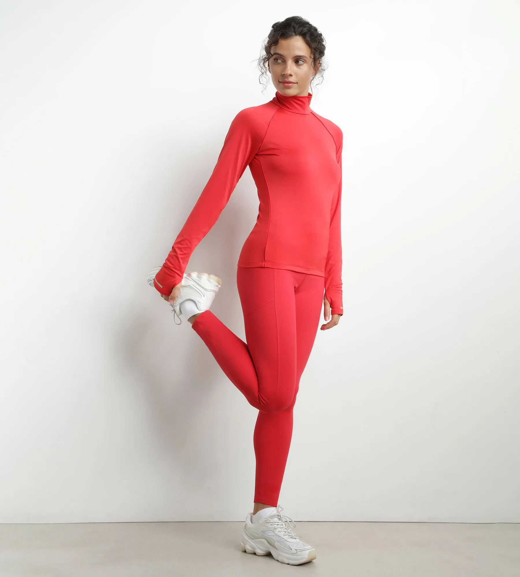 Women's sports top with high collar in red microfiber Dim Move